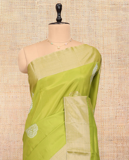 Green Uppada Saree, Decked Up with Floral Buttas, a Bavanji Border, Contrast Intricate Pallu, and a Contrast Blouse