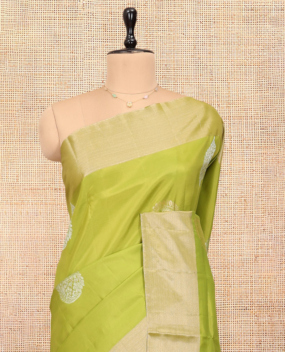 Green Uppada Saree, Decked Up with Floral Buttas, a Bavanji Border, Contrast Intricate Pallu, and a Contrast Blouse