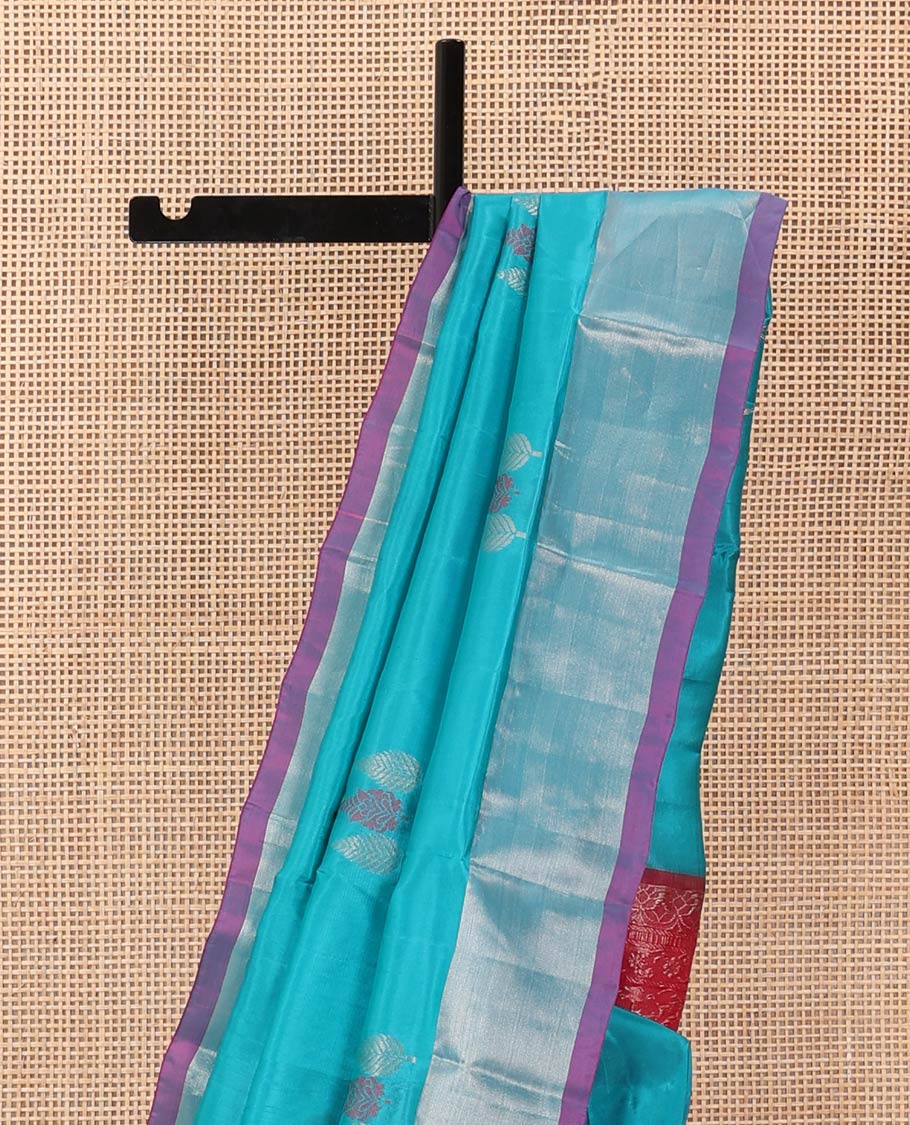 Blue cypress tree buttas Uppada saree, contrast bavanji border, and jaal design pallu