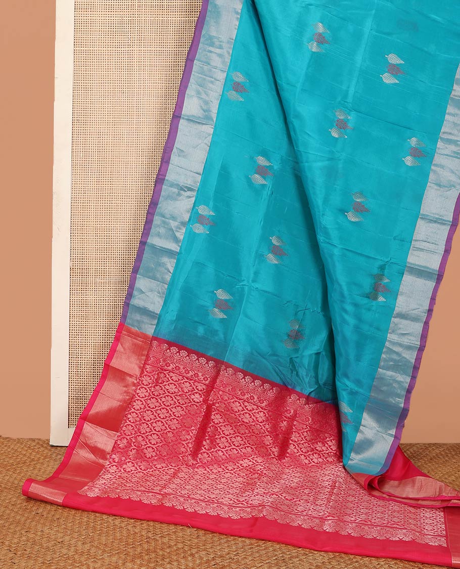 Blue cypress tree buttas Uppada saree, contrast bavanji border, and jaal design pallu