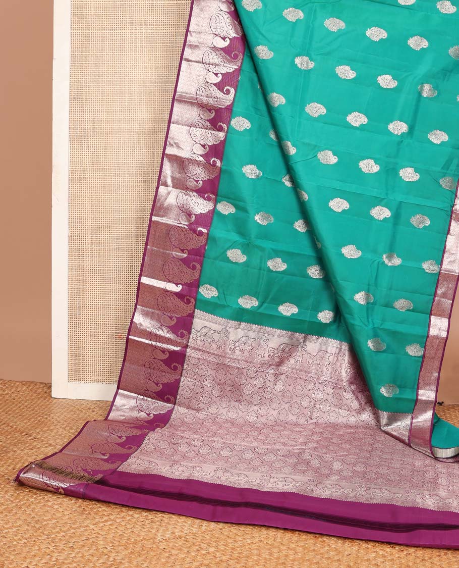 Green manga buttas Vasundhara silk mix saree, contrast manga butta & geometric patterns border & pallu of spade designs