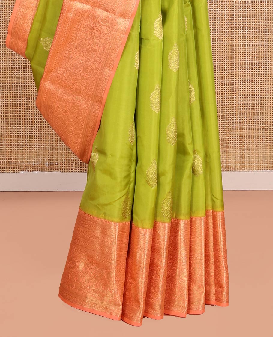 Green Vasundhara Lite-Silk Mix Saree, Embellished with Zari Buttas on Its Body, Complemented by Contrast Border of Mayil Kann, Laddu Kamalam, and Mayil Designs, Gracefully Woven Pallu of Jaal Designs, and Paired with a Contrast Blouse