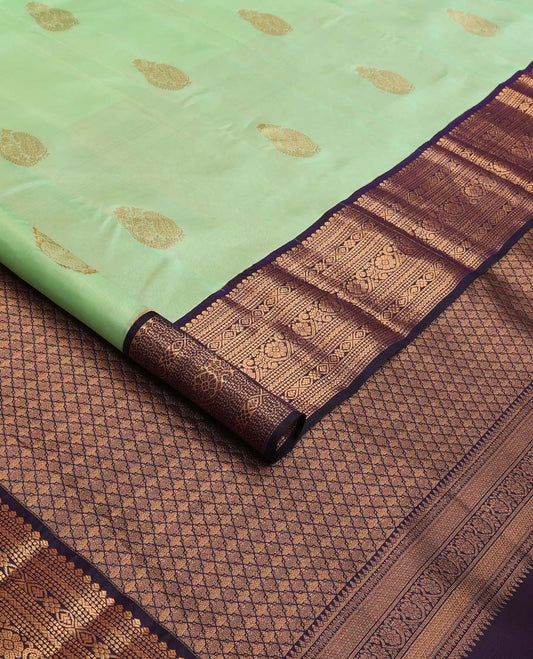 Green zari buttas Vasundhara silk mix saree, contrast traditional zari border, and jaal pallu