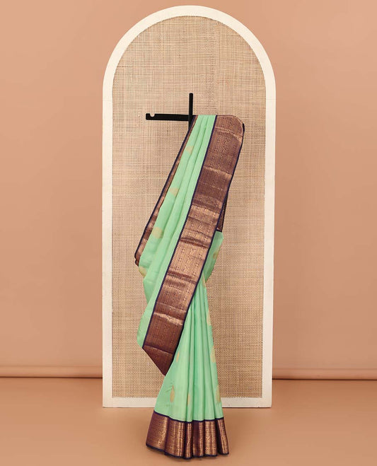 Green zari buttas Vasundhara silk mix saree, contrast traditional zari border, and jaal pallu