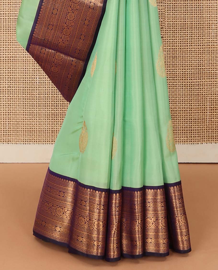 Green zari buttas Vasundhara silk mix saree, contrast traditional zari border, and jaal pallu