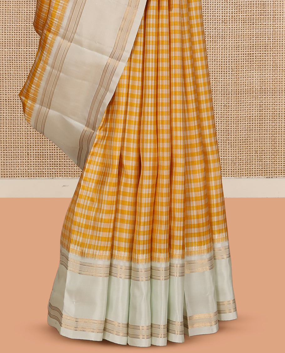 Yellow Checked Vasundhara Lite Silk Mix Saree, a Contrast Rettai Pettu Border, Zari Striped Pallu, and a Contrast Blouse