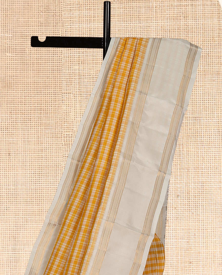 Yellow Checked Vasundhara Lite Silk Mix Saree, a Contrast Rettai Pettu Border, Zari Striped Pallu, and a Contrast Blouse