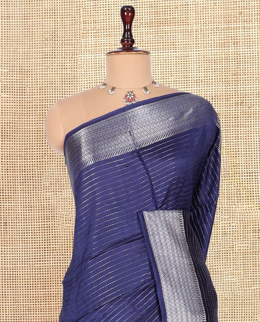 Blue Banana Pith Saree, Enriched with Zari Stripes, a Zari Border, Checked Pallu, and Matching Blouse