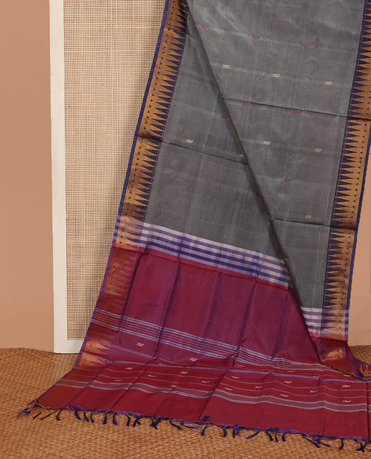 Grey buttas banana pith saree, contrast temple border, and contrast pallu of stripes, and buttas