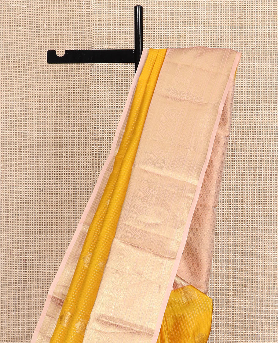 Yellow zari buttas and checked silk saree, contrast border of rekku, muthu, kathir, diamond, rudraksham, and floral designs, and jaal pallu