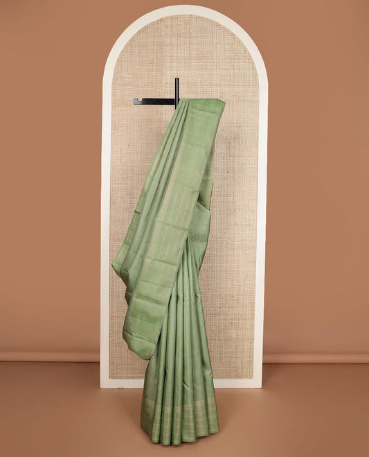 Green zari micro-checked silk saree, zari striped border & zari stripes steeped pallu