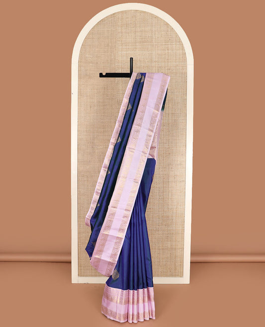 Blue zari buttas silk saree with contrast rettai pettu border of rekku, kathir, and mayil designs, and zari-rich pallu