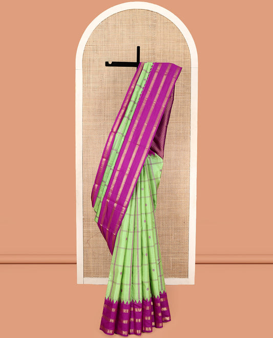 Green Vasundhara Silk Saree, Delicately Woven with Butta Enclosed Checks, Complemented by a Contrast Thazampoo Rekku Border of Banaras, Intricately Designed Pallu, and a Contrast Blouse