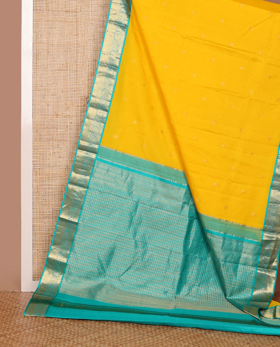 Yellow zari buttas silk saree, contrast intricate pallu & border of rekku,muthu,floral & kuyil kann designs
