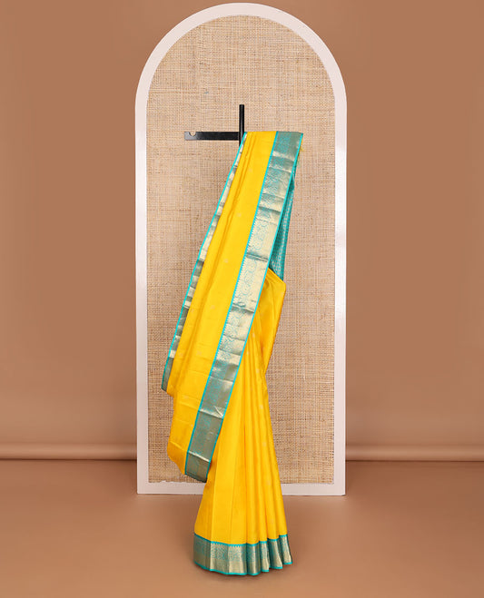 Yellow zari buttas silk saree, contrast intricate pallu & border of rekku,muthu,floral & kuyil kann designs