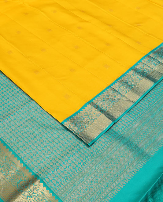 Yellow zari buttas silk saree, contrast intricate pallu & border of rekku,muthu,floral & kuyil kann designs
