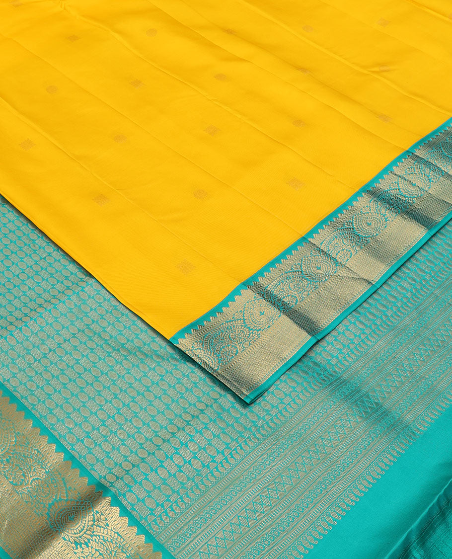 Yellow zari buttas silk saree, contrast intricate pallu & border of rekku,muthu,floral & kuyil kann designs