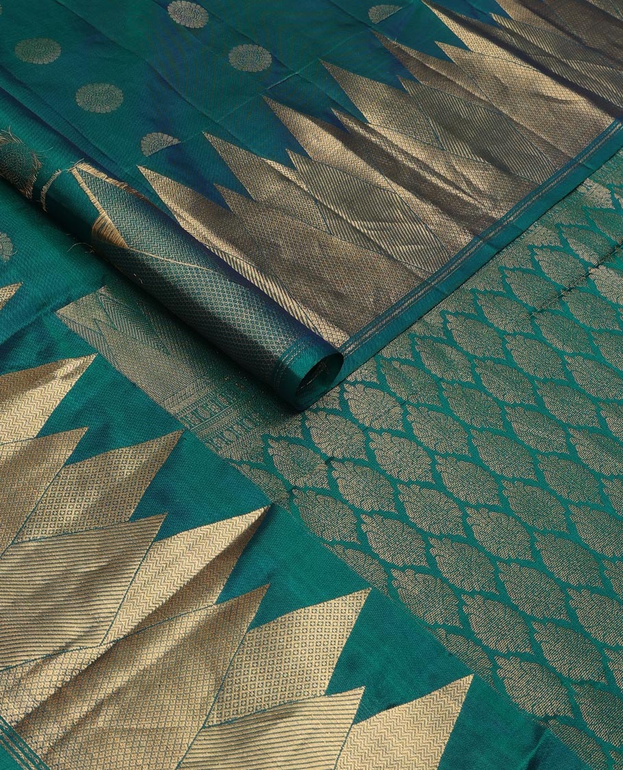 Peacock blue chakram buttas silk saree, zari border of vanki, zari stripes & mayil kann designs & jaal pallu