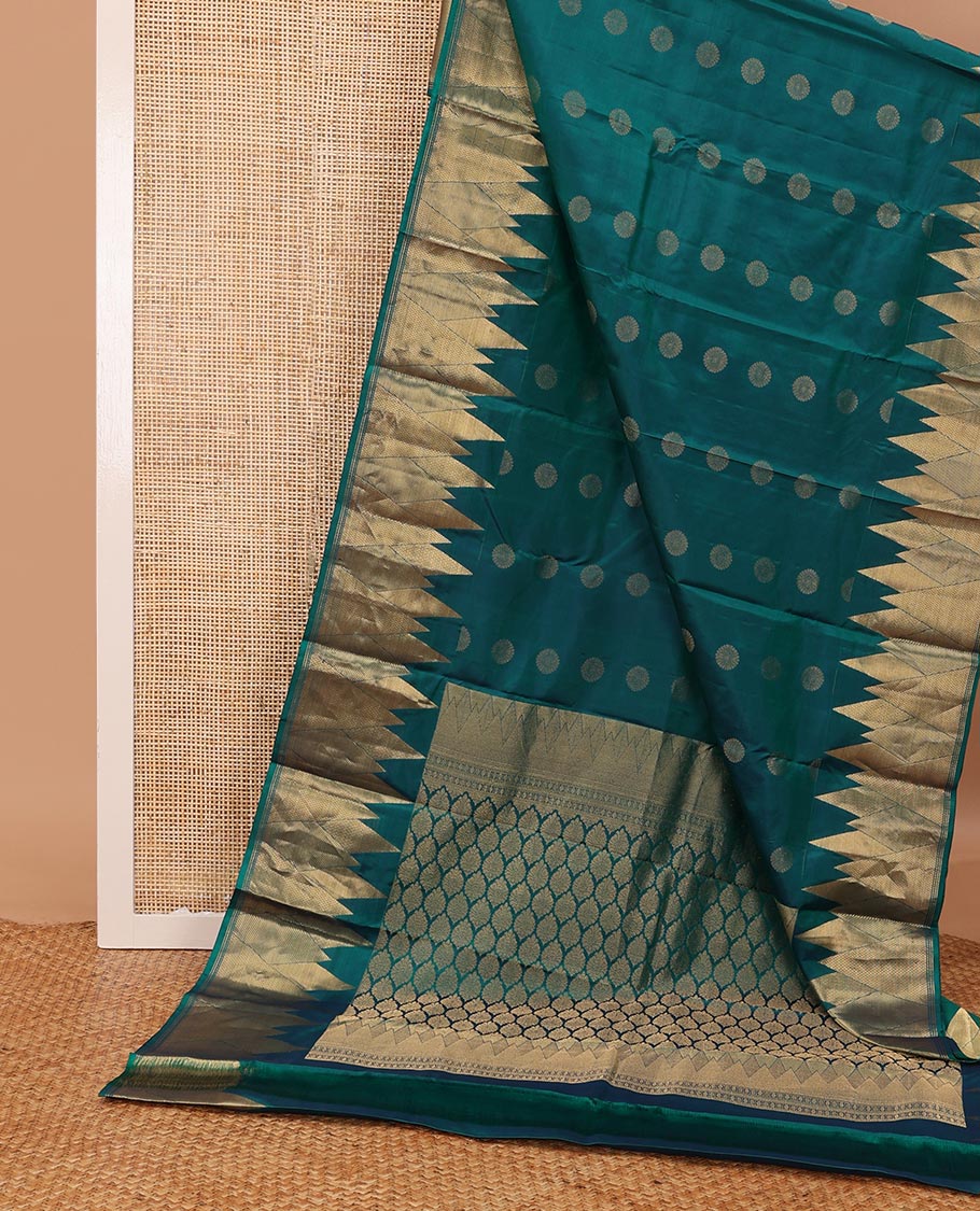 Peacock blue chakram buttas silk saree, zari border of vanki, zari stripes & mayil kann designs & jaal pallu