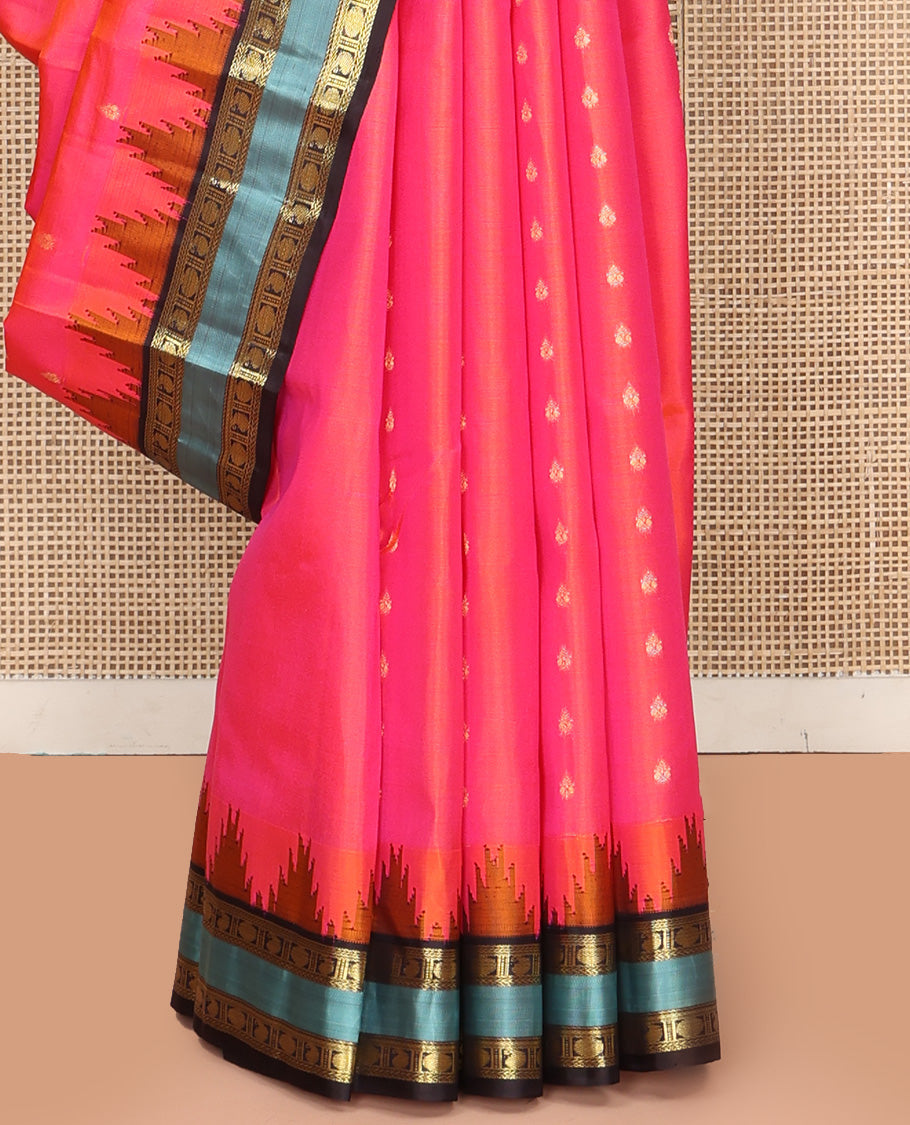 Pink Vasundhara Silk Saree, Adorned with Zari Buttas All Over Its Body, Complemented by Contrast Temple Rettai Pettu Border of Manga and Poun Designs, Grand Pallu and Paired with a Contrast Blouse