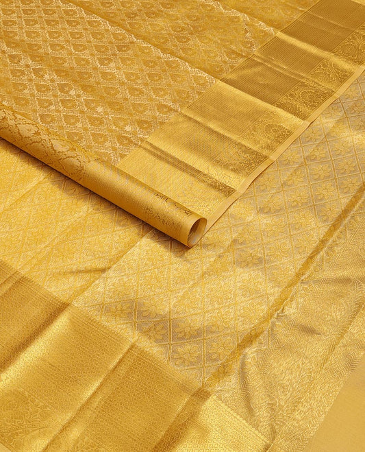 Yellow jacquard kanchipuram wedding silk saree, zari border of traditional design & pallu of floral motif enclosed jaal design