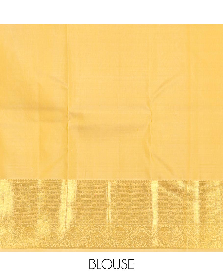 Yellow jacquard kanchipuram wedding silk saree, zari border of traditional design & pallu of floral motif enclosed jaal design
