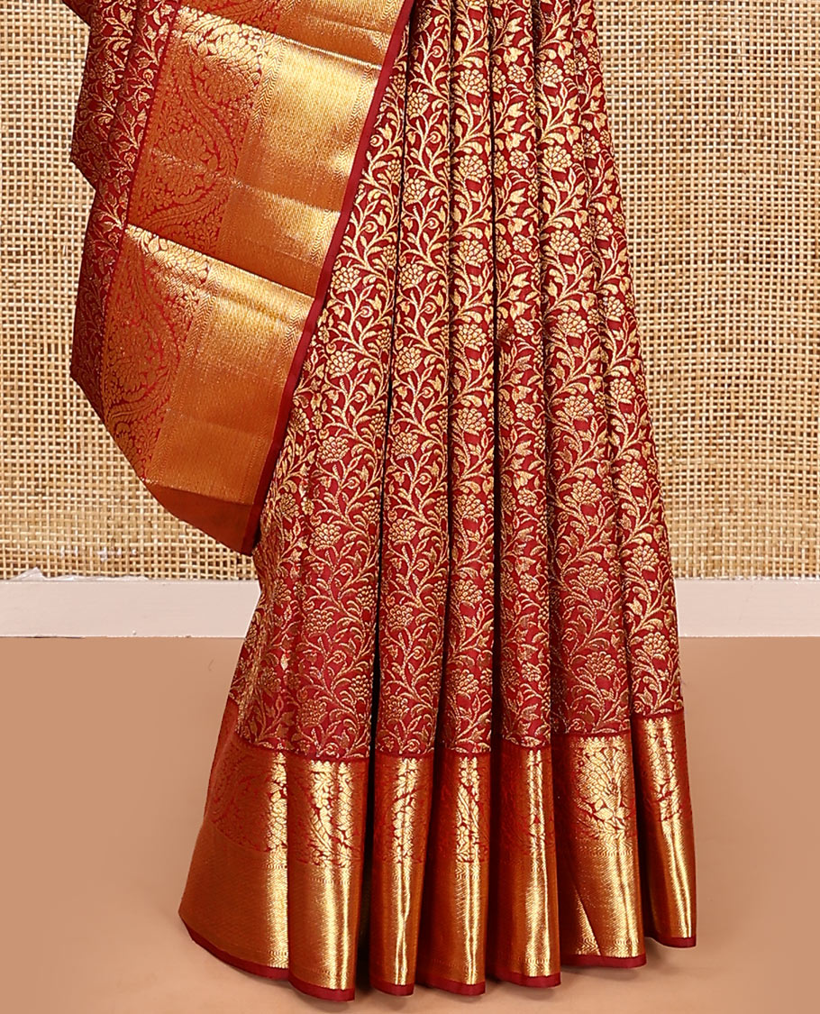 Red jacquard kanchipuram silk saree, zari border of thilakam, kathir, muthu, and dhavana kodi designs, and butta enclosed jaal pallu
