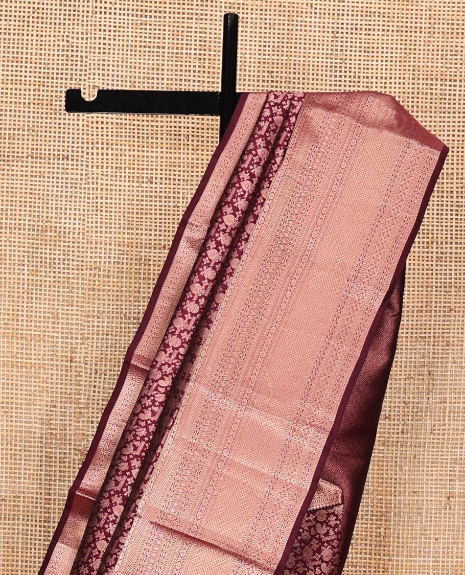 Maroon Kanchipuram Wedding Silk Saree, Elegantly Embellished with Jacquard Design on Its Body, Highlighted by Zari Border of Thilakam Mokku, Kathir, Cross Kamalam, and Mayil Kann Designs, Grand Jaal Pallu, and Paired with a Matching Blouse