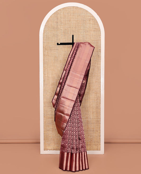 Maroon Kanchipuram Wedding Silk Saree, Elegantly Embellished with Jacquard Design on Its Body, Highlighted by Zari Border of Thilakam Mokku, Kathir, Cross Kamalam, and Mayil Kann Designs, Grand Jaal Pallu, and Paired with a Matching Blouse