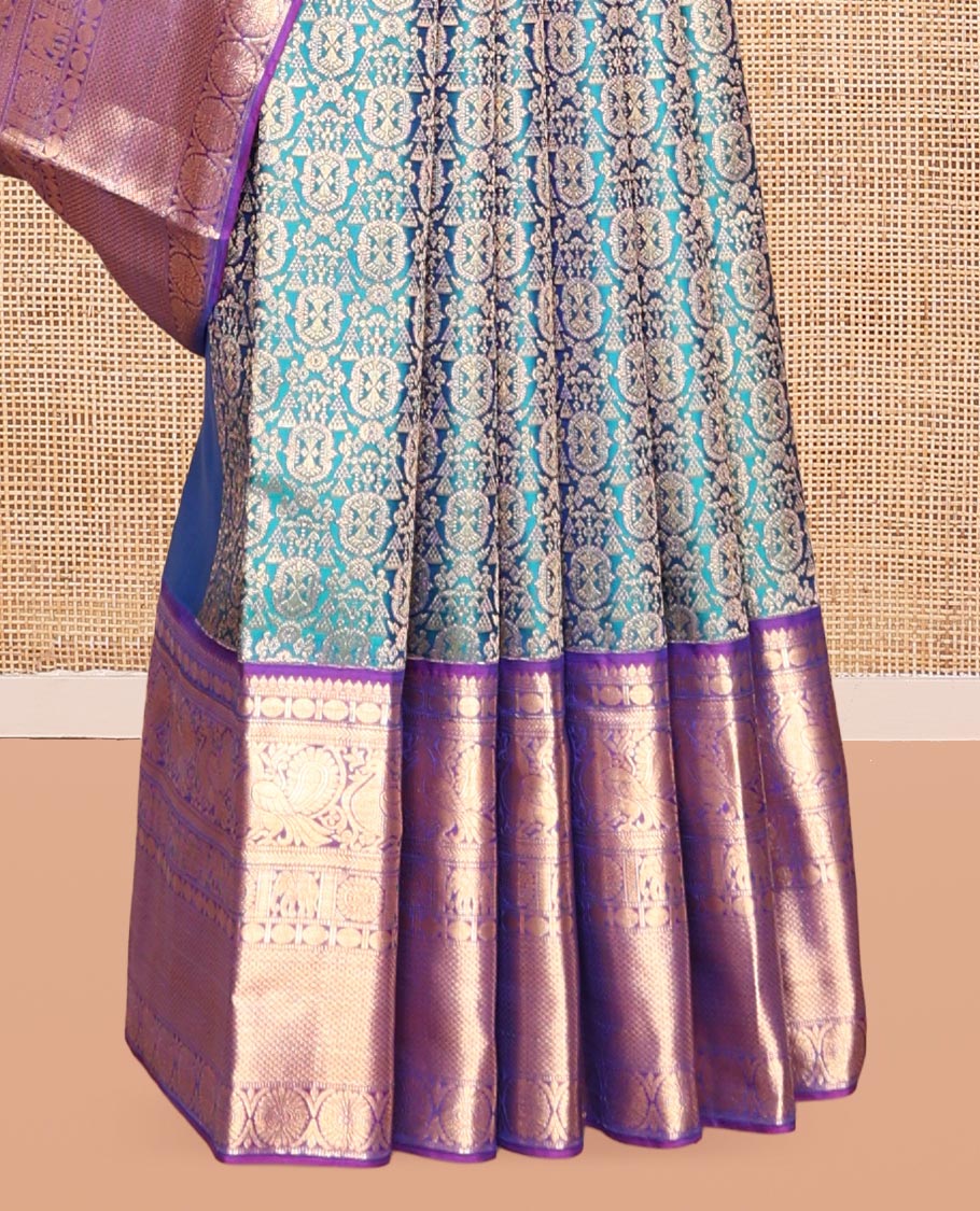 Blue Kanchipuram Wedding Silk Saree, Embellished with Jacquard Design, a Contrast Border of Thilakam, Rudraksham, Mayil, Yaanai, Chakram, and Mayil Kann, Grand Pallu, and a Contrast Blouse