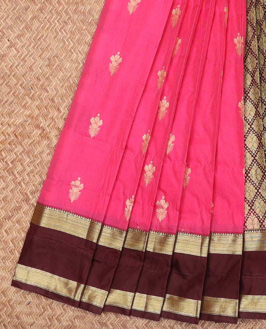Pink Budget Silk Saree, Richly Detailed with Floral Buttas All Over Its Body, Complemented by a Contrast Traditional Zari Design Rettai Pettu Border, Gracefully Woven Pallu of Jaal Designs, and Paired with a Contrast Blouse