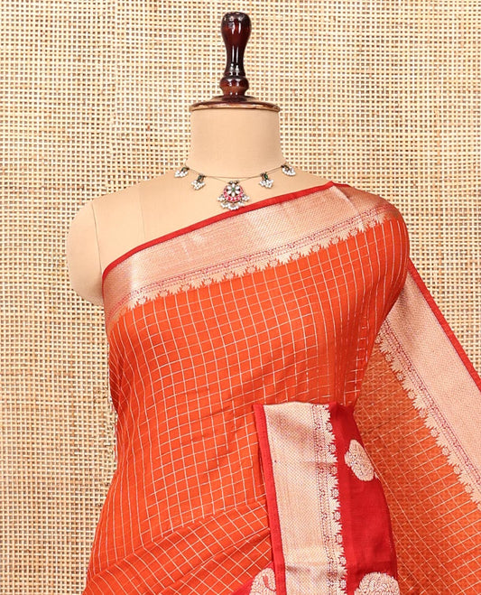 Orange Assam Silk Saree, Embellished with Checks, Complemented by Contrast Traditional Paisley Zari Design Border, Zari Striped Pallu, and a Contrast Blouse