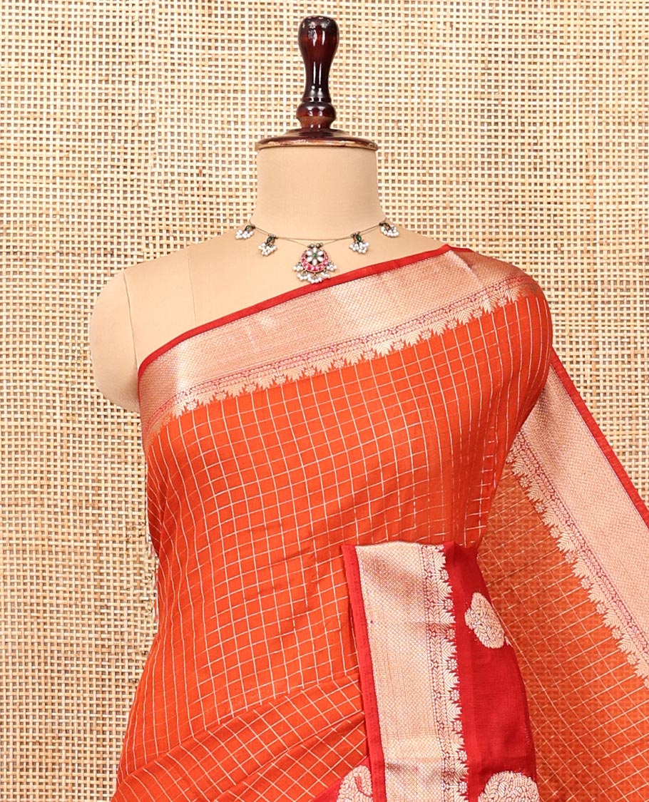 Orange Assam Silk Saree, Embellished with Checks, Complemented by Contrast Traditional Paisley Zari Design Border, Zari Striped Pallu, and a Contrast Blouse
