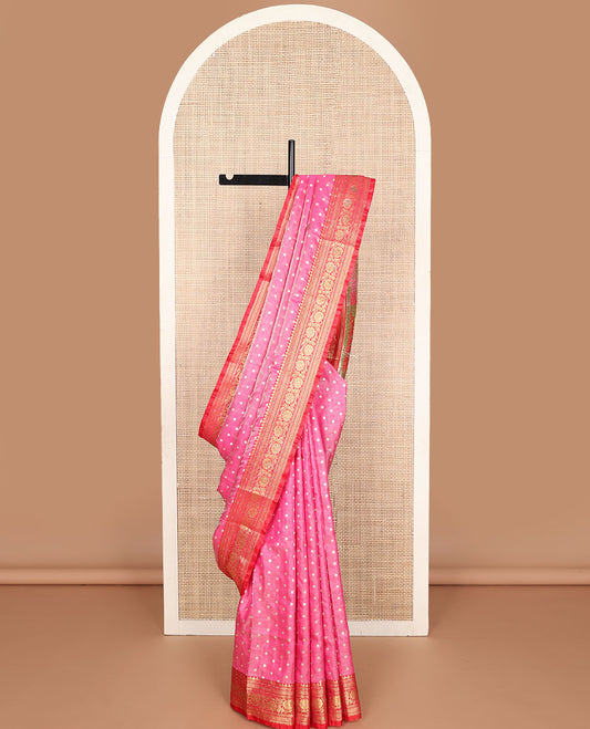 Pink buttas semi banaras nylon with contrast intricate zari design border & floral design pallu