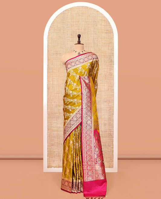 Yellow Banarasi Satin Saree, Majestically Detailed with Floral Jaal Jacquard, a Contrast Floral Creeper Border, Intricate Stonework Pallu, and a Contrast Blouse
