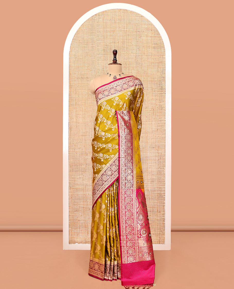 Yellow Banarasi Satin Saree, Majestically Detailed with Floral Jaal Jacquard, a Contrast Floral Creeper Border, Intricate Stonework Pallu, and a Contrast Blouse
