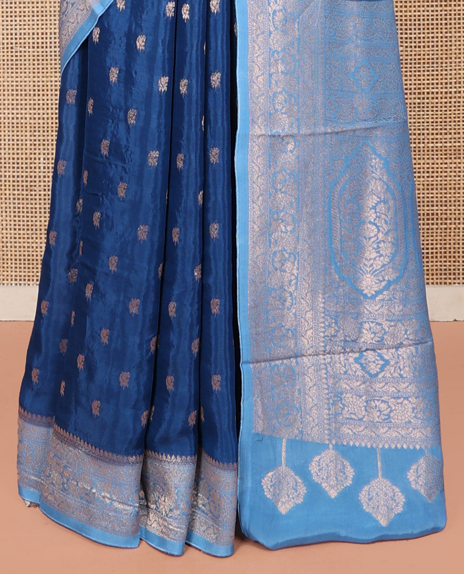 Blue Fancy Crepe Saree, Graced with Buttas, Complemented by a Contrast Floral Border, Intricately Designed Pallu, and a Contrast Blouse