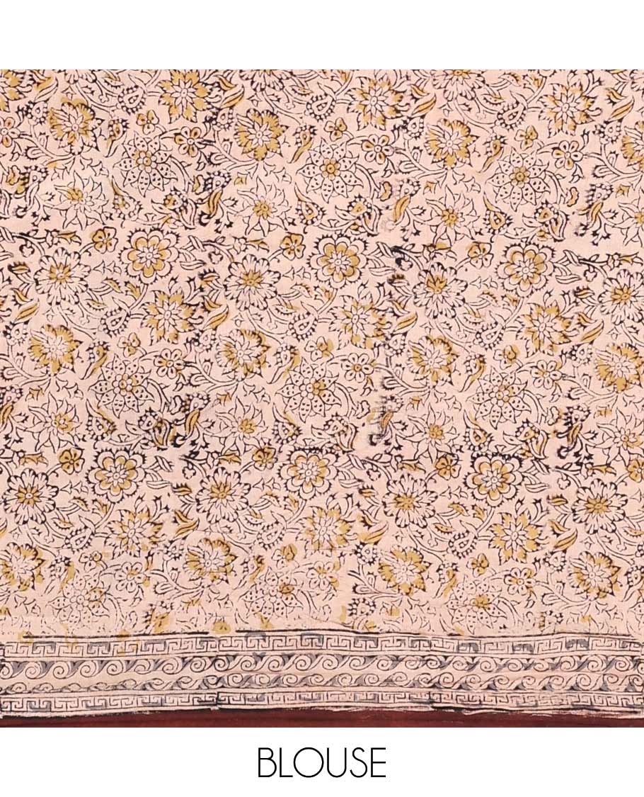 Brown floral vine machine-printed Kalamkari cotton saree, geometric printed border, and pallu of floral and paisley print