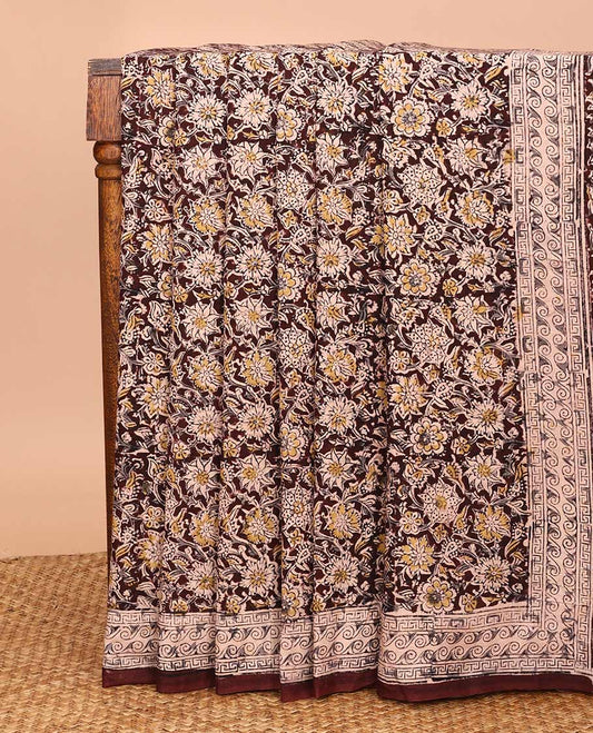 Brown floral vine machine-printed Kalamkari cotton saree, geometric printed border, and pallu of floral and paisley print