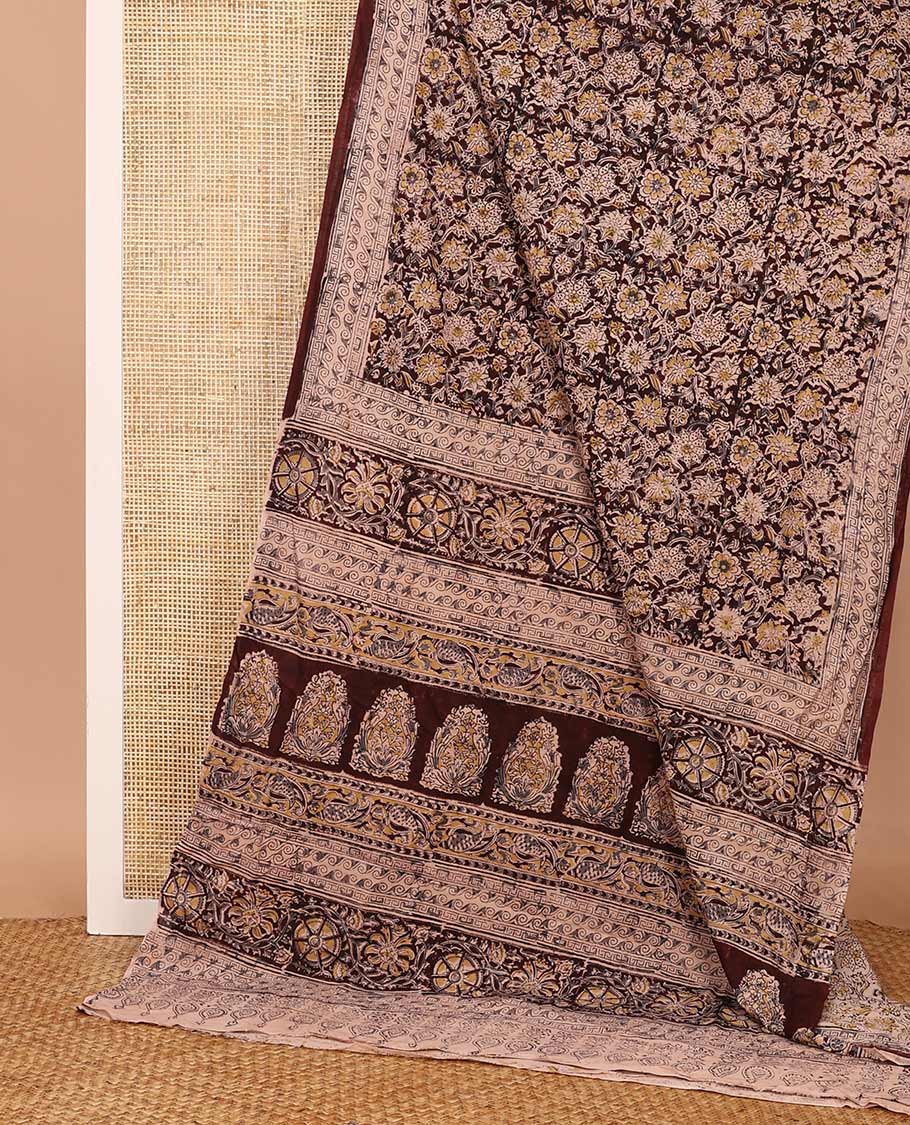 Brown floral vine machine-printed Kalamkari cotton saree, geometric printed border, and pallu of floral and paisley print