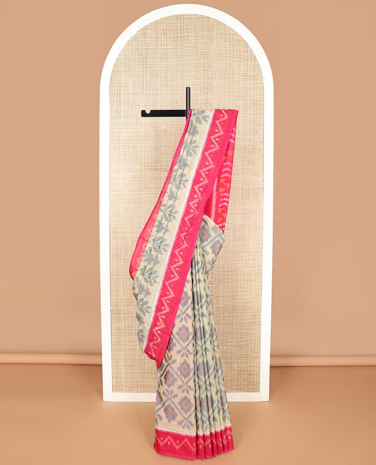 Cream floral design ikkat cotton sareee with contrast border & geometrric design pallu
