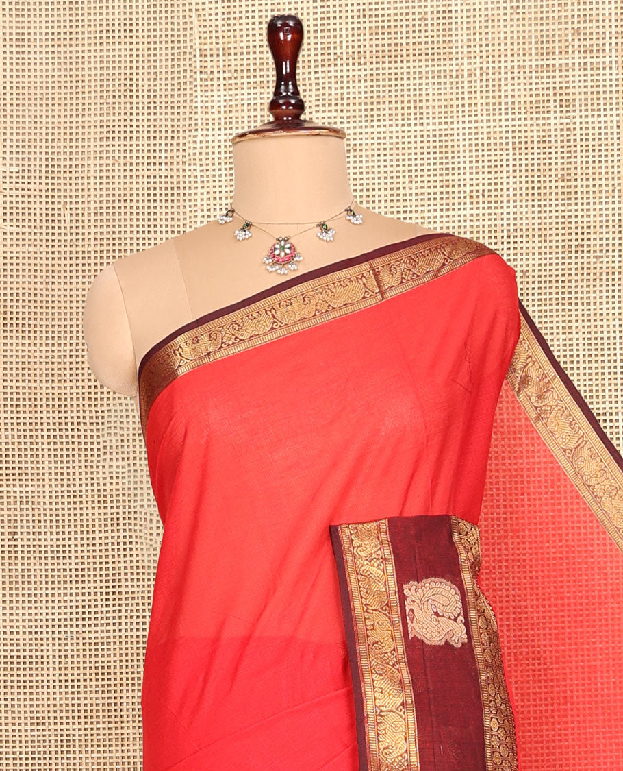 Red Plain Chettinad Cotton Saree, Complemented by a Contrast Traditional Zari Elephant-Peacock Border, Striped Pallu, and a Matching Blouse