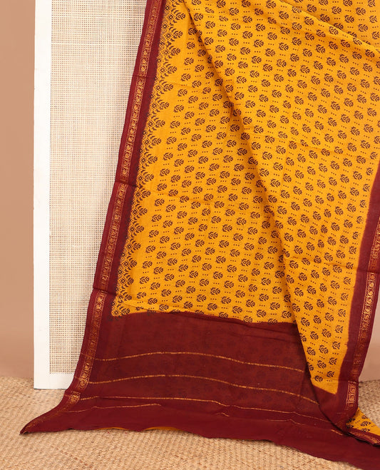 Yellow unique motifs printed Sungudi cotton saree, contrast traditional zari border & zari striped pallu
