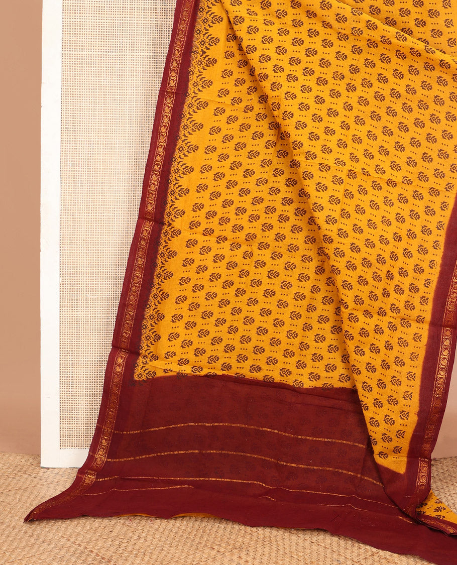 Yellow unique motifs printed Sungudi cotton saree, contrast traditional zari border & zari striped pallu