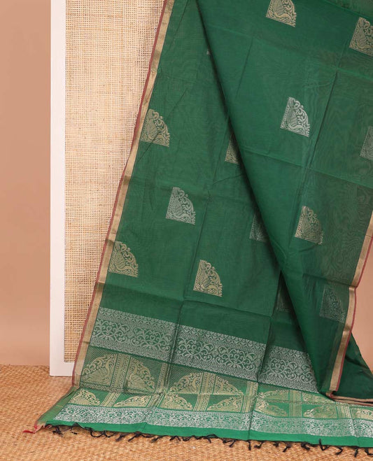 Green zari buttas Coimbatore cotton saree, zari piping border, and pallu of Mughal style peacock designs