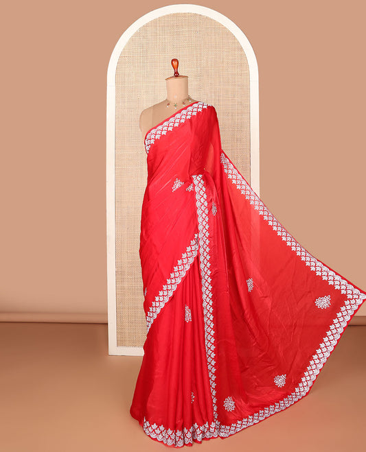 Red stone embroidered motifs designer saree, stone embroidered border