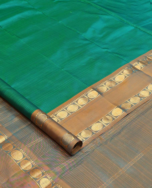Green striped Kanchipuram silk saree, contrast rettai pettu border of rekku, and rudraksham designs, and zari striped pallu