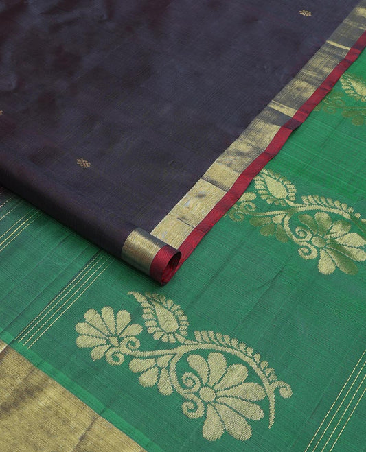 Dark blue zari buttas Kanchipuram silk saree, contrast bavanji border, and floral zari design pallu