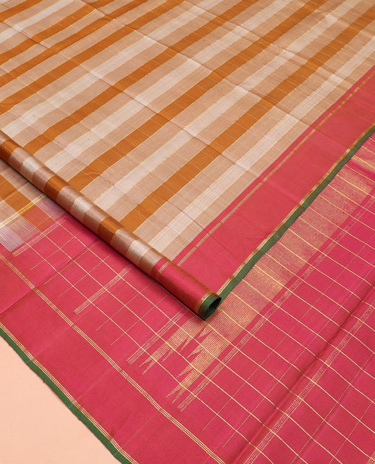 Multi-colored striped and zari muthu striped Kanchipuram silk saree, contrast bodi border of zari stripes, and pallu of thazampoo rekku designs