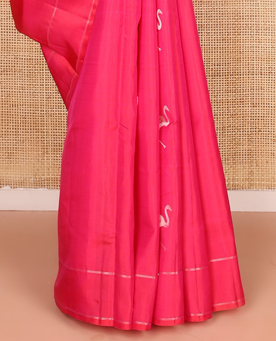 Pink flamingo zari buttas soft silk saree, zari striped border, and zari-rich jaal pallu